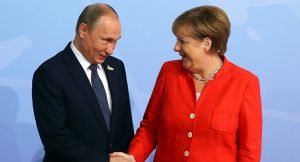 Tổng thống Nga Putin và Thủ tướng Đức Merkel.