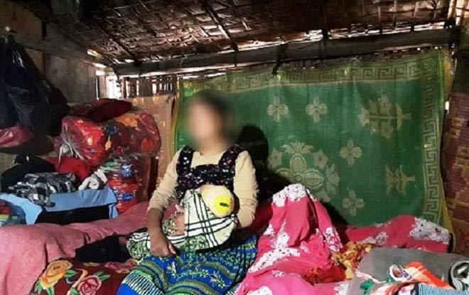 Chị H.T.C. mang đứa con nhỏ trở về từ Trung Quốc sau gần 10 năm bị lừa bán làm vợ.