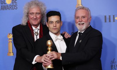 Rami Malek (giữa) được tôn vinh cùng "Bohemian Rhapsody". Ảnh: AFP.