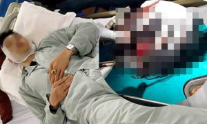 Anh Th. bị chém toác đầu, đang được điều trị ở bệnh viện