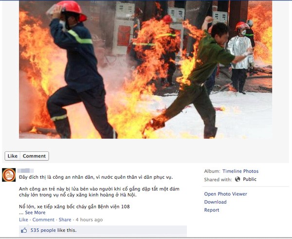 Một facebooker viết: " Vì bức ảnh này mà chúng ta yêu quý công an hơn" - Nguyễn Khánh/ Tuổi Trẻ