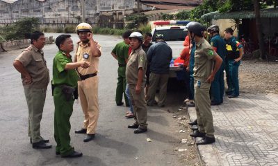 Lực lượng công an tiến hành kiểm tra đột xuất đối với các tài xế xe đầu kéo container ở khu vực ra vào cụm cảng Trường Thọ, cửa ngõ phía Đông TPHCM.
