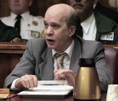 Nghi phạm John Evander Couey.