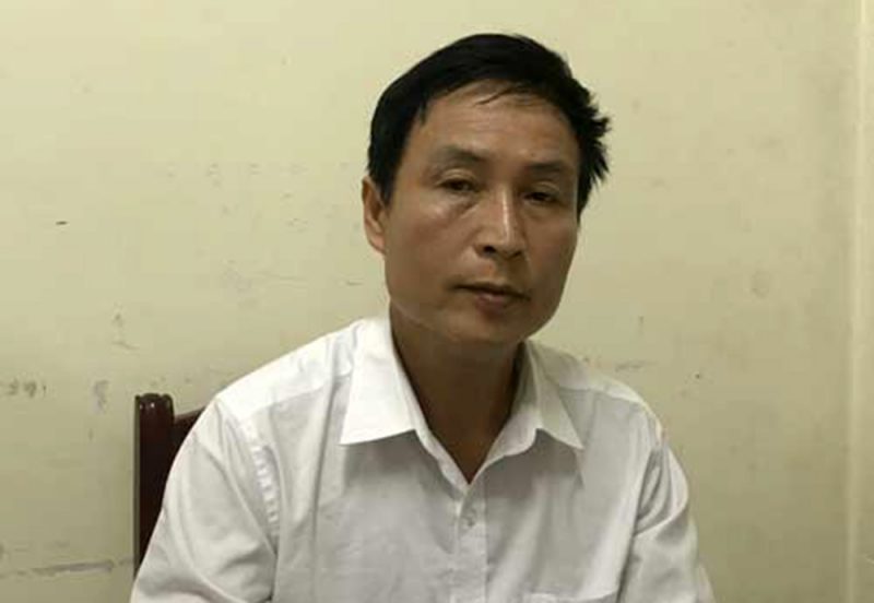 Hoàng Đình Nam tại cơ quan công an. Ảnh: Báo CAND
