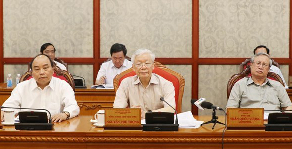 Từ trái qua: Thủ tướng Nguyễn Xuân Phúc, Tổng bí thư, Chủ tịch nước Nguyễn Phú Trọng, Thường trực Ban bí thư Trần Quốc Vượng tại cuộc họp Bộ Chính trị. Ảnh: TTX