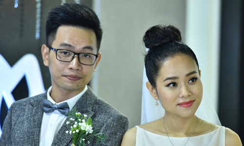 Hoàng Quyên và chồng trong đám cưới hồi tháng 7 năm ngoái. Ảnh: Giang Huy.