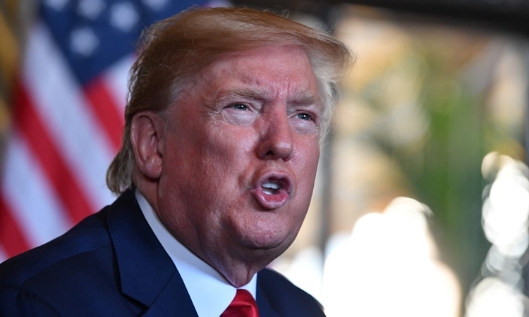 Tổng thống Mỹ Trump tại Florida ngày 24/12. Ảnh: AFP.