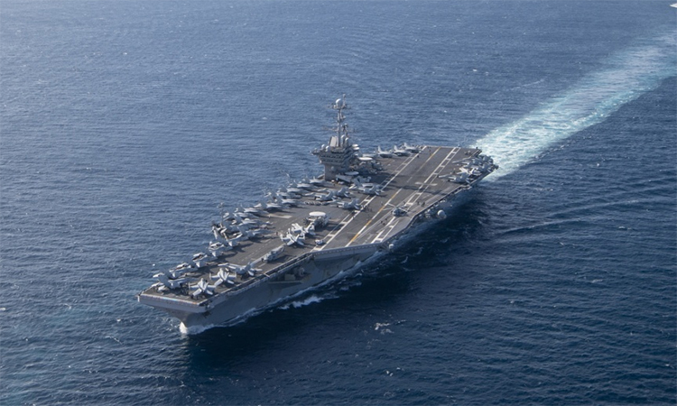 Tàu sân bay USS Harry S. Truman đi qua eo biển Gibraltar vào khu vực Địa Trung Hải ngày 5/12. Ảnh: US Navy.
