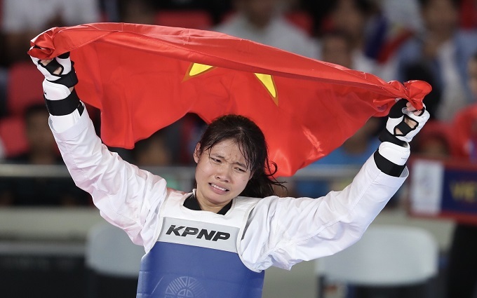 Giọt nước mắt hạnh phúc của Bạch Thị Khiêm. Cô vượt qua võ sĩ chủ nhà Delo Laila trong trận chung kết hạng dưới 67 kg nữ môn taekwondo với tỷ số 5-3 để đem về tấm HC vàng.