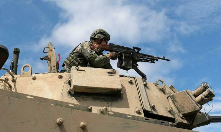 Binh sĩ luyện tập ở huyện Bình Đông, đảo Đài Loan hôm 30/5. Ảnh: Reuters.