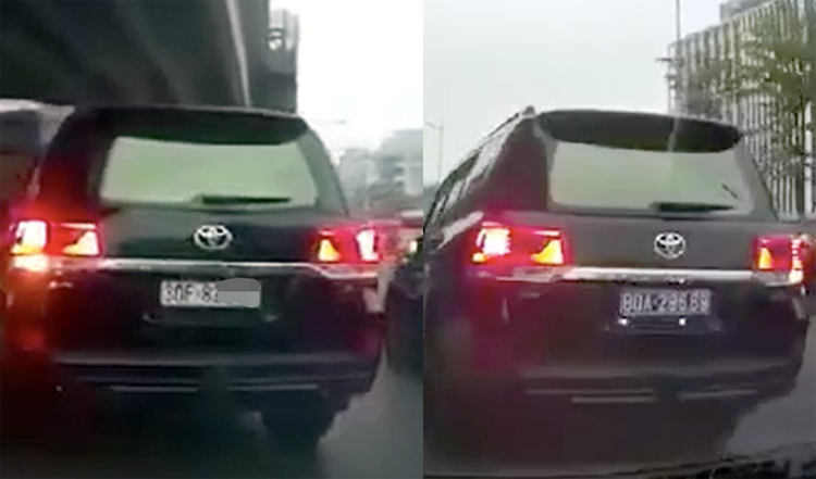 Chiếc xe Land Cruiser mang hai biển, trắng và biển xanh. Ảnh cắt từ clip