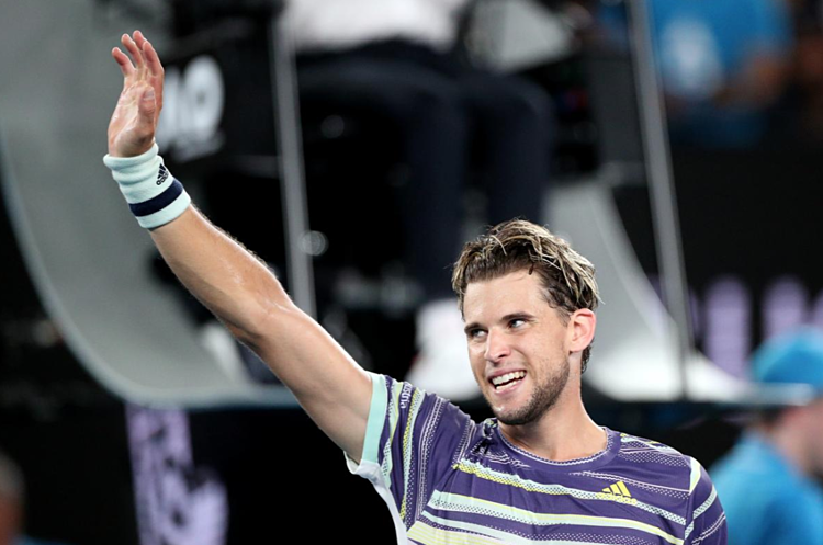 Thiem phấn khích với chiến thắng đầu tay trước Nadal tại một giải Grand Slam. Ảnh: Reuters. 