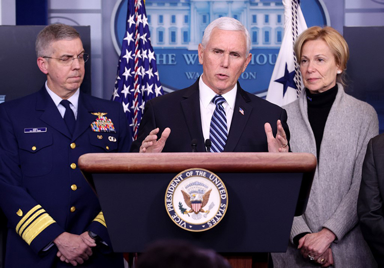 [Caption] U.S. Vice President Mike Pence and members of the Coronavirus Task Force hold a press briefing at the White House March 6, 2020 in Washington,
