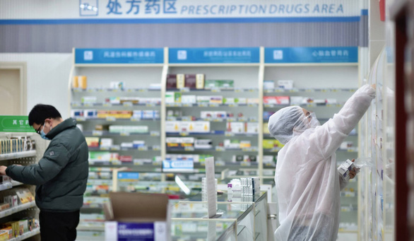 Trung Quốc dùng thuốc chữa cúm đang được Nhật thử nghiệm để chữa virus corona - Ảnh 1.