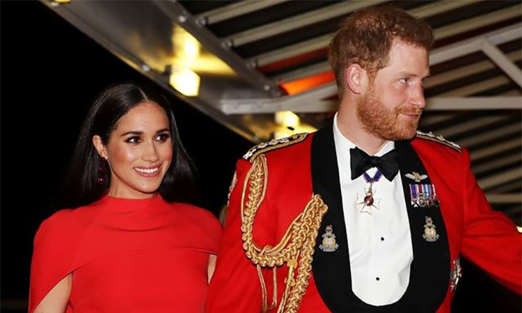 Harry - Meghan tại Liên hoan âm nhạc Mountbatten ở London, Anh hôm 7/3. Ảnh: Reuters.