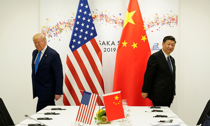 Tổng thống Donald Trump (trái) và Chủ tịch Tập Cận Bình tại hội nghị G20 ở Osaka, Nhật Bản, tháng 6/2019. Ảnh: Reuters.