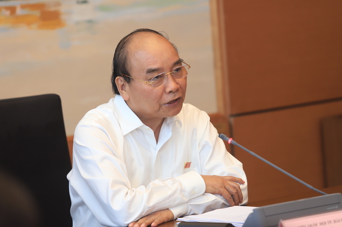 Thủ tướng Nguyễn Xuân Phúc phát biểu tại họp tổ chiều 8/6. Ảnh: Thường Trần