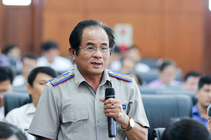 Ông Trần Phước Thu trả lời tại phiên thảo luận chiều 7/7. Ảnh: Nguyễn Đông.