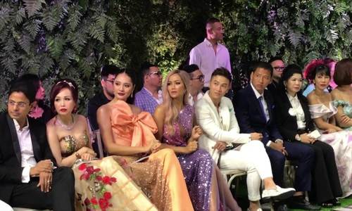 Hoa hậu HHen nhún nhẩy khi ngồi xem catwalk