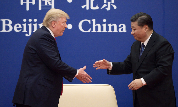 Tổng thống Donald Trump (trái) và Chủ tịch Tập Cận Bình tại Bắc Kinh, Trung Quốc, hồi tháng 9/2017. Ảnh: AFP.