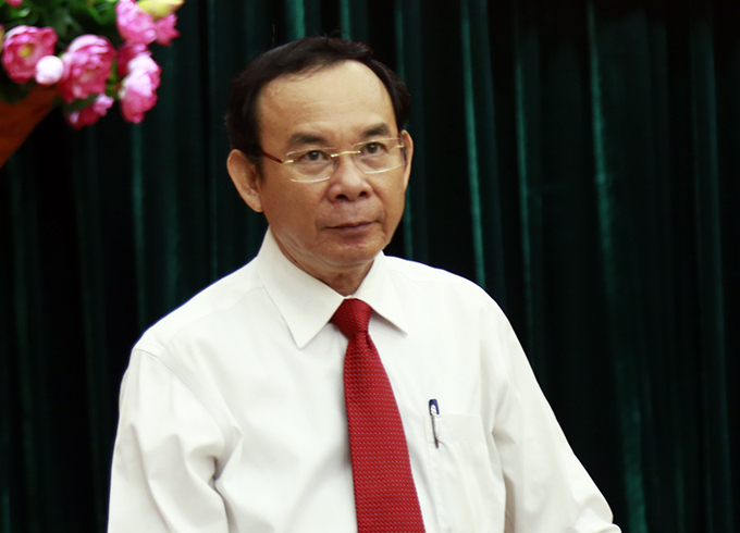 Ông Nguyễn Văn Nên tại hội nghị công bố quyết định sáng nay. Ảnh: Hữu Công